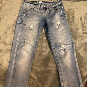 Sound girl light ripped jeans